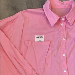 Oversized pink shirt with tag detail